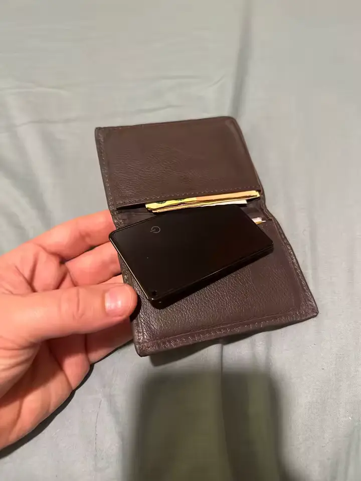 FindCard Pro inside a brown leather wallet